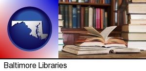 Baltimore, Maryland - books on a library table and on library bookshelves