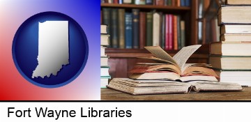 books on a library table and on library bookshelves in Fort Wayne, IN