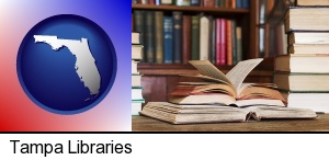 Tampa, Florida - books on a library table and on library bookshelves