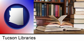 books on a library table and on library bookshelves in Tucson, AZ