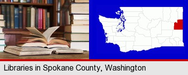 books on a library table and on library bookshelves; Spokane County highlighted in red on a map