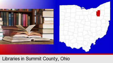 books on a library table and on library bookshelves; Summit County highlighted in red on a map